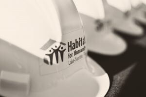 close up of Habitat for Humanity Lake-Sumter hard hats