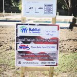 veterans village Watson Realty house sponsor sign