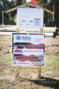veterans village Watson Realty house sponsor sign