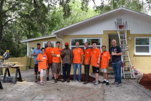 Group photo of Home Depot volunteers at a Preservation and Repair project