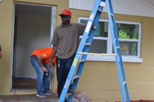 Coleman Preservation and Repair homeowner posing