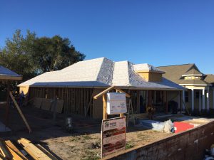 Veterans Village volunteers building first house