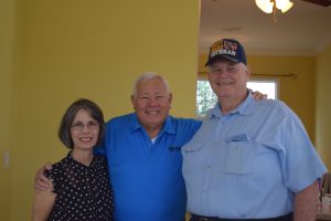 Veterans Village Family photo with Board member Felix R.