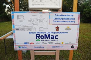 Future home build by Leesburg High School Construction Academy sponsor sign