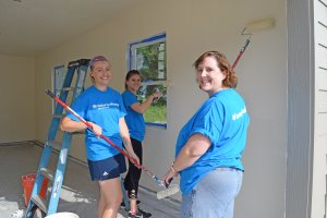 Oxford Site Women Build 2019 - painting interior of garage