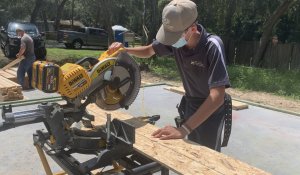 student using table saw