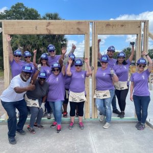 Women Build 2021, group photo with AgeWave Solutions, Inc and future homeowners