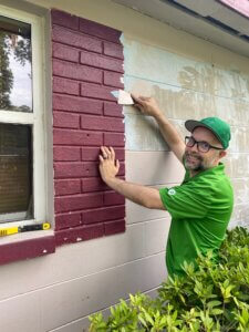 publix volunteer scraping paint 2022