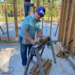 smiling volunteer on women build site 2022